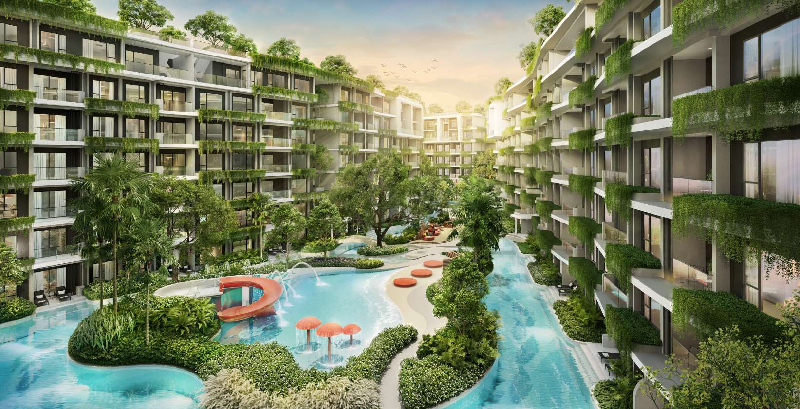 Aerial view of The Modeva resort lagoon pools and low-rise residences at Bang Tao Beach, Phuket